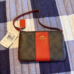 Coach Wristlet with Gold Logo